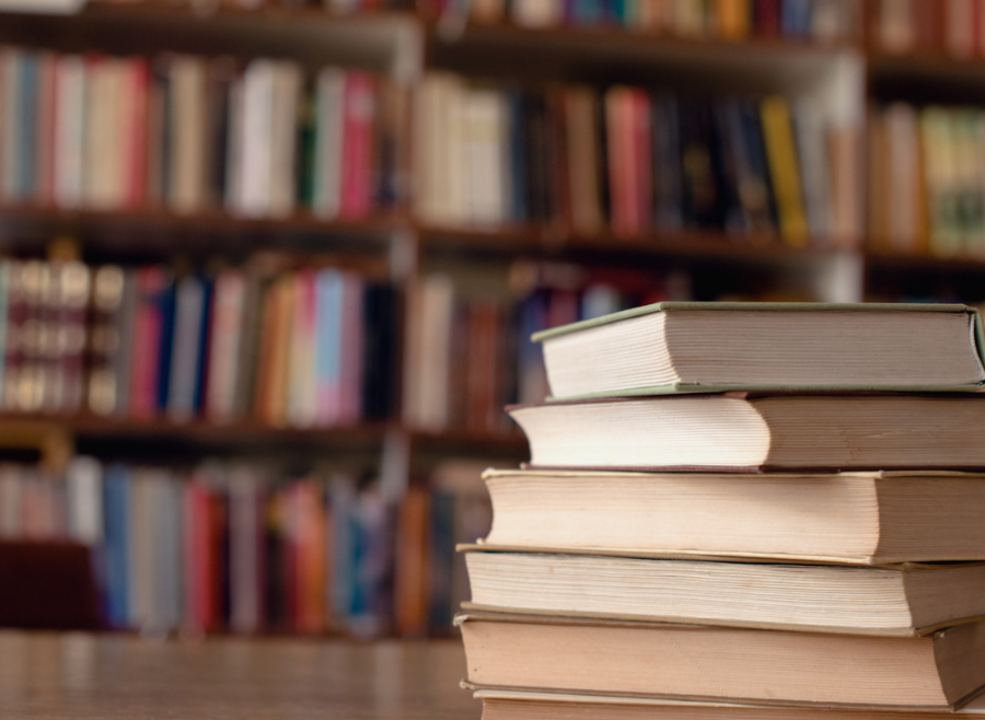 staked books in library setting